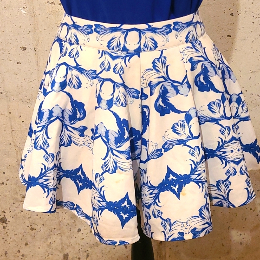 Beautiful Akira skirt/short with matching royal blue blouse.